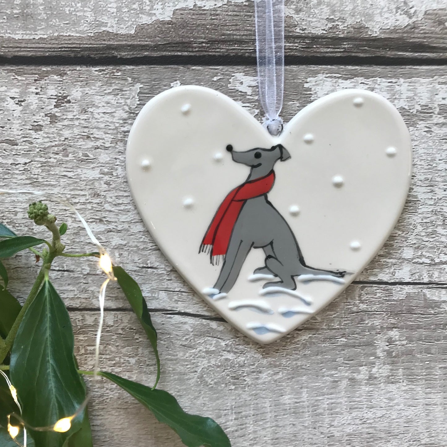 Hand Painted Ceramic Heart Decoration – Whippet / Greyhound Dog with Red Scarf in Snow | Personalised Dog Gift