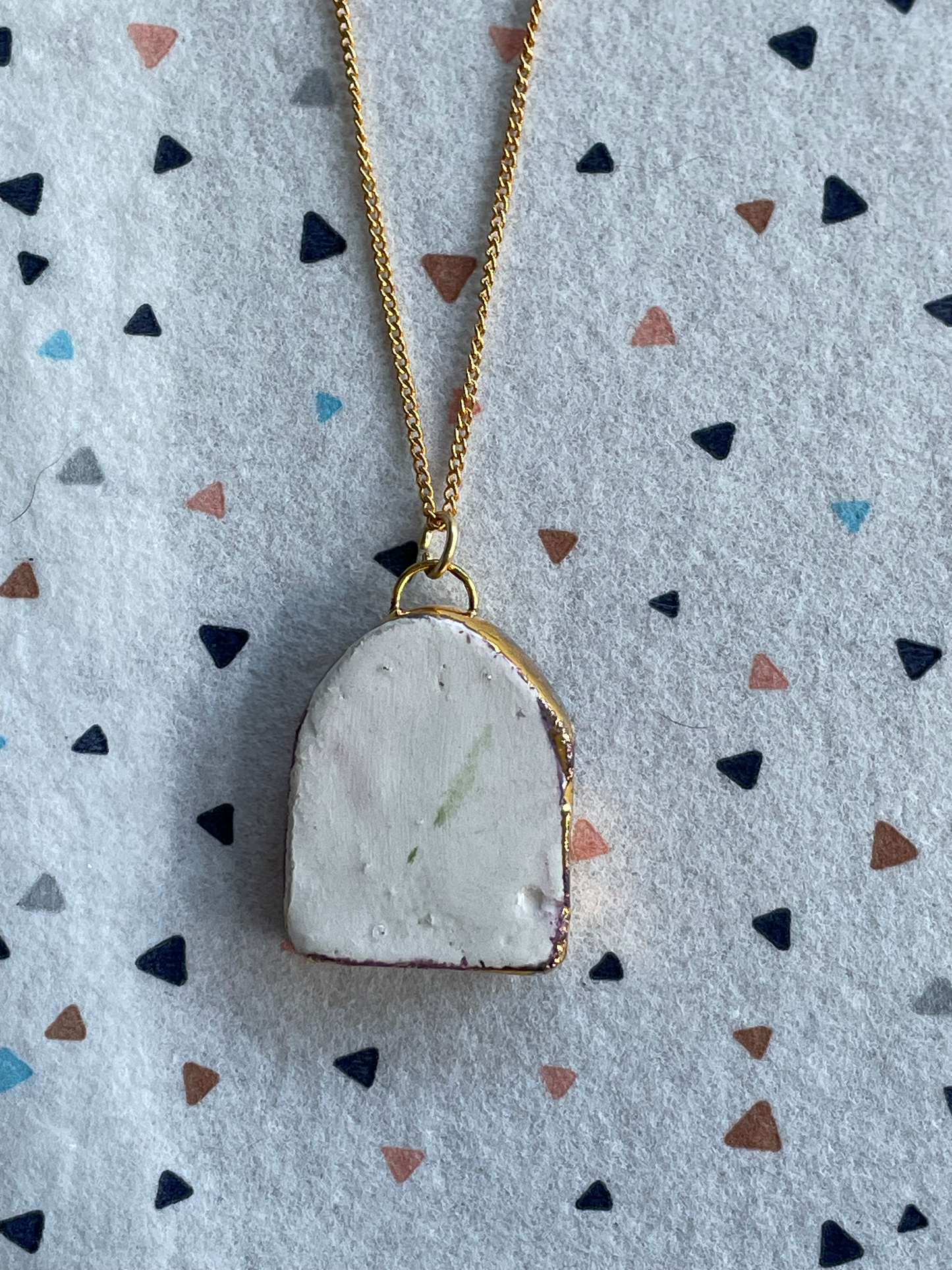 Seconds - Handmade Ceramic Charm Necklace with hand painted blue hand design