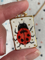 Seconds - Handmade Ceramic Charm Necklace with hand painted Ladybird design