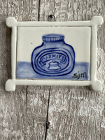 Seconds - A Mini Masterpiece - A study of Marmite in Blue