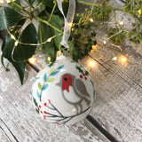 Hand Painted Ceramic Bauble Decoration - Robin sitting on a branch