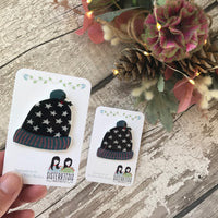 Navy Bobble Hat with Stars and Holly Handmade Pin