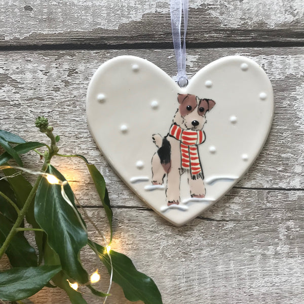Hand Painted Ceramic Heart - Fox Terrier/Airedale with scarf sitting in the snow