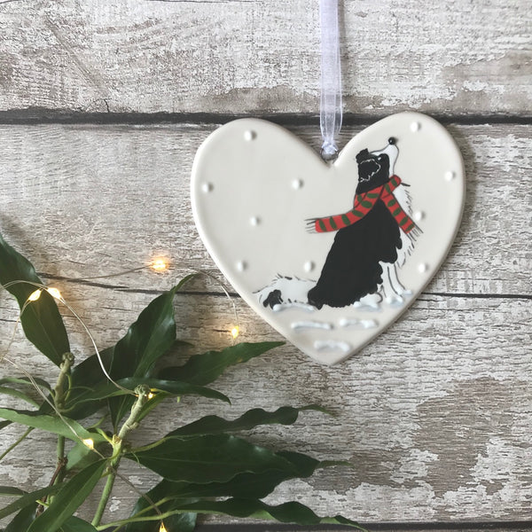 Hand Painted Ceramic Heart - Collie/Black & White Dog with scarf sitting in the snow