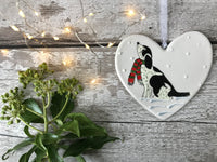 Hand Painted Ceramic Heart Christmas Decoration - Black and White Spaniel / Cockapoo with scarf sitting in the snow